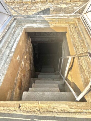 Entering the tomb at the archeological site in Zaachila